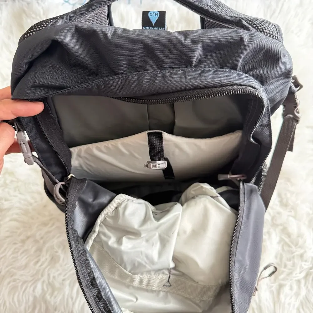 Osprey Daylite Plus Backpack in Black featuring a front stash pocket - Picture 6 of 14